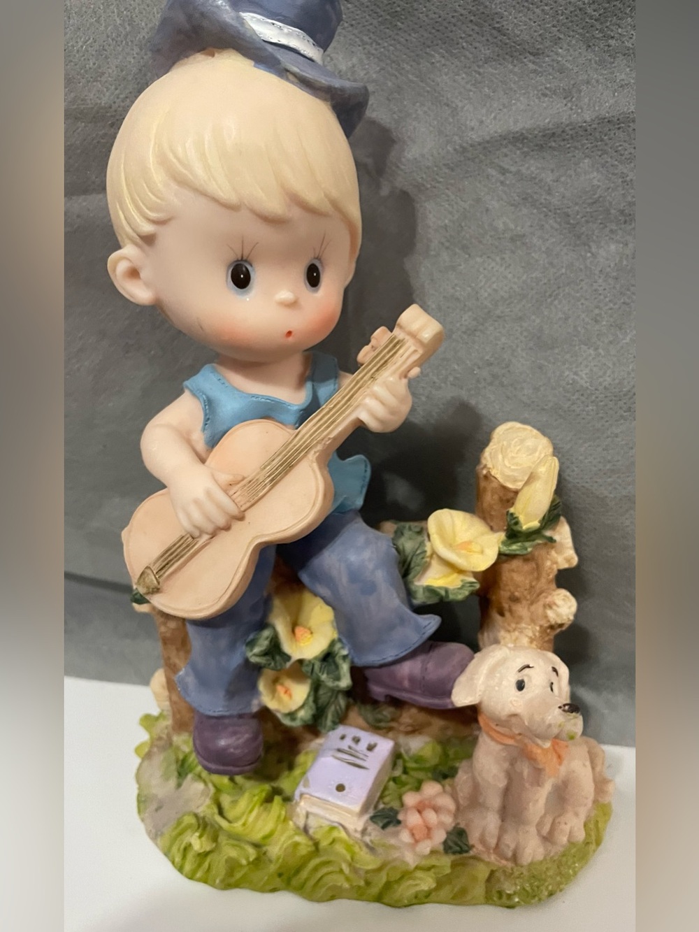 Unknown Brand Blue and Cream Boy with Guitar Figurine